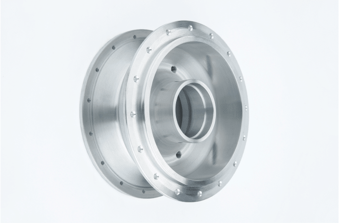 A close up of a CNC Turned metal wheel.