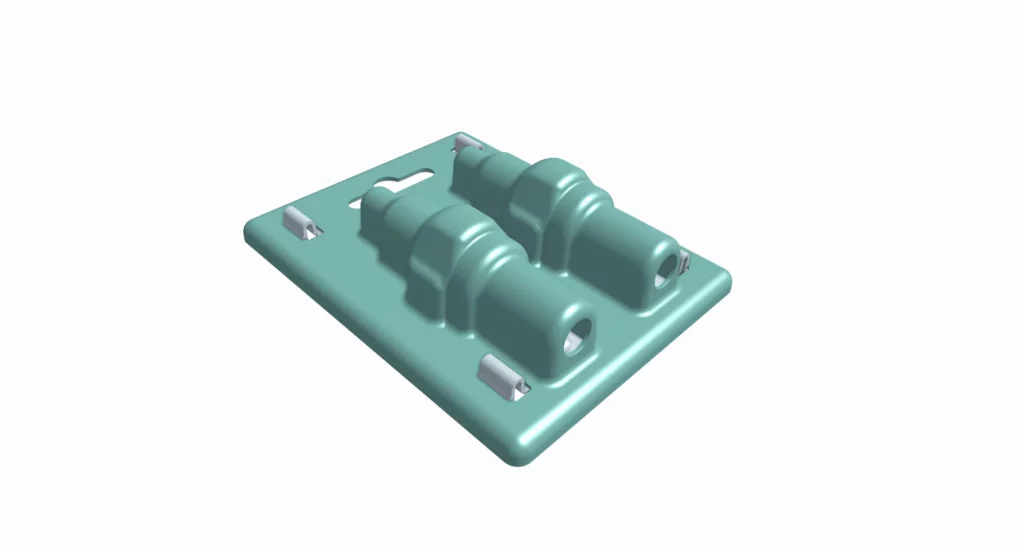 A teal plastic rectangular base, made by compression molding vs injection molding, features two cylindrical raised sections, four metal clips, and a heart-shaped cutout on a white background.