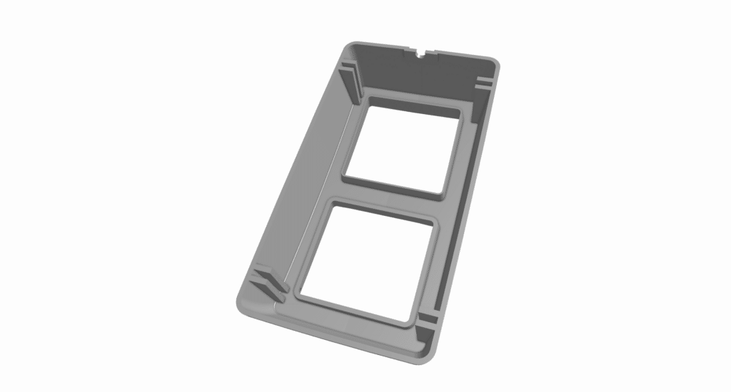 A 3D-rendered image of a rectangular, gray plastic mounting frame—crafted through cnc plastic machining—with two square cutouts and rounded corners, viewed from an angled perspective.