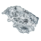 Silver metal engine casing with multiple circular openings and detailed contours, shown against a plain white background.