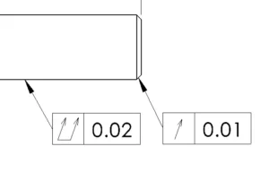 Single-arrow circular runout and double-arrow total runout symbols controlling shaft concentricity.