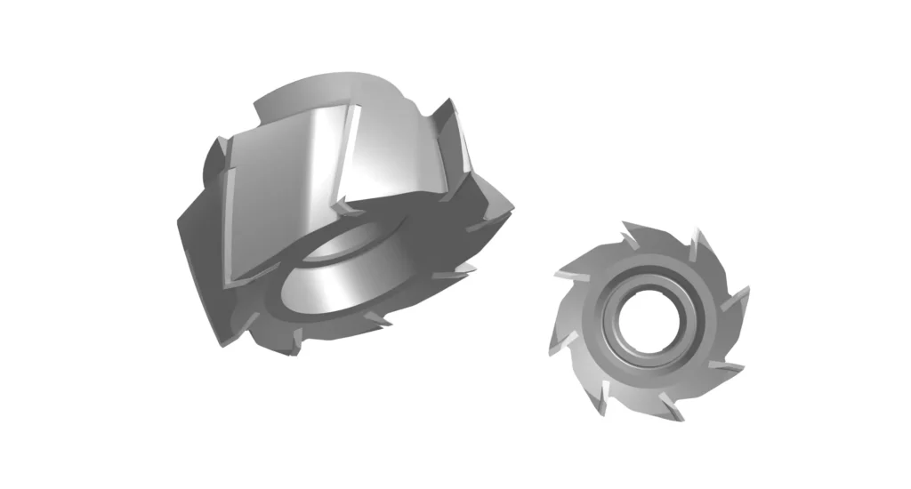 Arbor-mounted shell mill with brazed inserts, showing the open-core multi-facet cutter design.