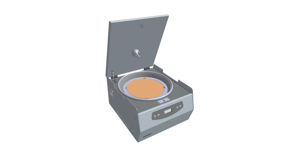Benchtop spin coater applying a uniform photoresist layer to a silicon wafer in semiconductor manufacturing.