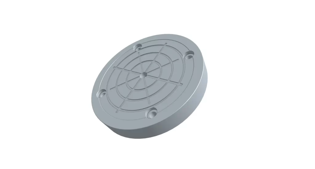 CNC machined aluminum vacuum chuck with concentric sealing grooves used to secure semiconductor wafers during precision processing.