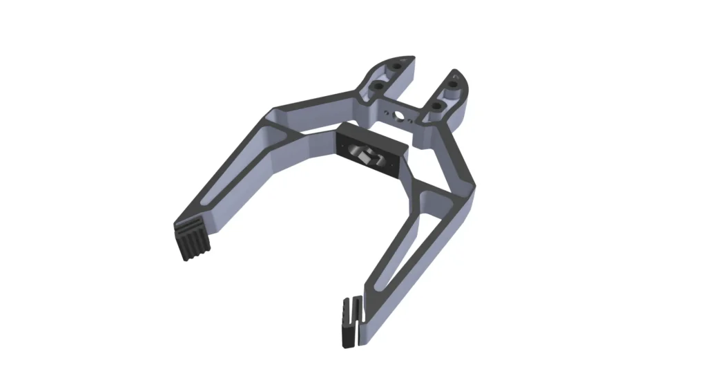 The same robot gripper redesigned for injection molding with heavy sections cored out and 1 degree draft about a center-line parting line
